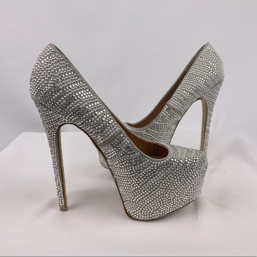 Steve Madden size 7 rhinestones and silver stud 4” heels.